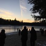 Sunset over frozen lake