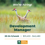 A square graphic, featuring a photo of two sandhill cranes in tall green grass. Overlaid is the text "We're hiring! Development Manager. 20-24 hours a week, $31,400 to $42,480." An orange line and the HLT logo follow.